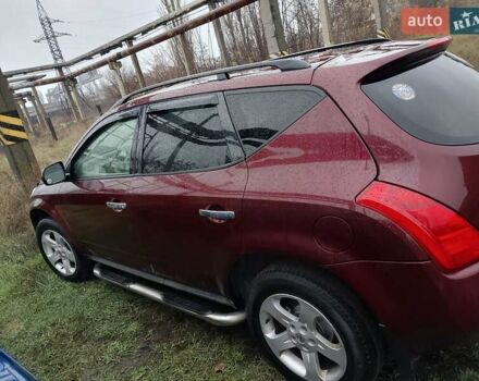 Червоний Ніссан Мурано, об'ємом двигуна 3.5 л та пробігом 270 тис. км за 5950 $, фото 1 на Automoto.ua