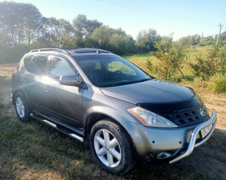 Серый Ниссан Мурано, объемом двигателя 3.5 л и пробегом 248 тыс. км за 4700 $, фото 1 на Automoto.ua