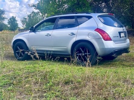 Серый Ниссан Мурано, объемом двигателя 3.5 л и пробегом 250 тыс. км за 4500 $, фото 1 на Automoto.ua