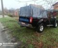 Чорний Ніссан НП, об'ємом двигуна 2 л та пробігом 420 тис. км за 5500 $, фото 1 на Automoto.ua