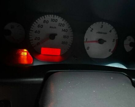 Чорний Ніссан НП, об'ємом двигуна 2.4 л та пробігом 330 тис. км за 12500 $, фото 5 на Automoto.ua