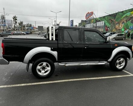 Чорний Ніссан НП, об'ємом двигуна 2.4 л та пробігом 330 тис. км за 12500 $, фото 7 на Automoto.ua