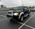 Чорний Ніссан НП, об'ємом двигуна 2.4 л та пробігом 330 тис. км за 12500 $, фото 1 на Automoto.ua