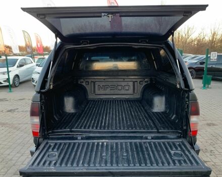 Черный Ниссан НП, объемом двигателя 2.5 л и пробегом 220 тыс. км за 14999 $, фото 13 на Automoto.ua