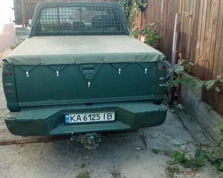 Красный Ниссан НП, объемом двигателя 2.5 л и пробегом 286 тыс. км за 4985 $, фото 5 на Automoto.ua