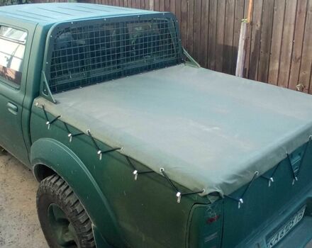 Красный Ниссан НП, объемом двигателя 2.5 л и пробегом 286 тыс. км за 4985 $, фото 4 на Automoto.ua