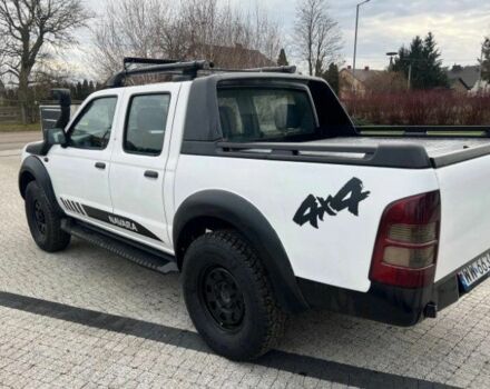 Білий Ніссан Навара, об'ємом двигуна 2.5 л та пробігом 220 тис. км за 2483 $, фото 3 на Automoto.ua