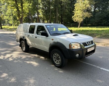 Белый Ниссан Навара, объемом двигателя 2.5 л и пробегом 123 тыс. км за 7958 $, фото 1 на Automoto.ua