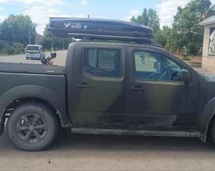 Белый Ниссан Навара, объемом двигателя 2.49 л и пробегом 270 тыс. км за 6000 $, фото 1 на Automoto.ua