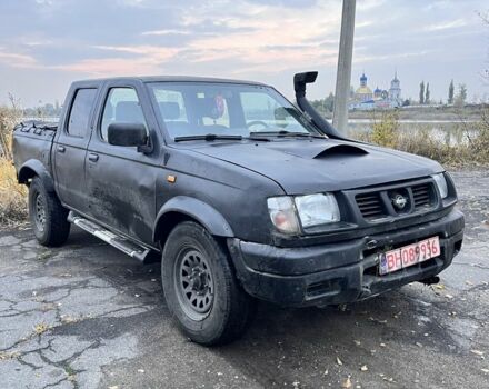 Черный Ниссан Навара, объемом двигателя 2.5 л и пробегом 165 тыс. км за 3622 $, фото 1 на Automoto.ua