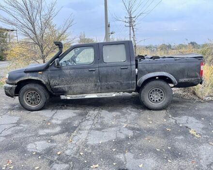 Черный Ниссан Навара, объемом двигателя 2.5 л и пробегом 165 тыс. км за 3622 $, фото 4 на Automoto.ua
