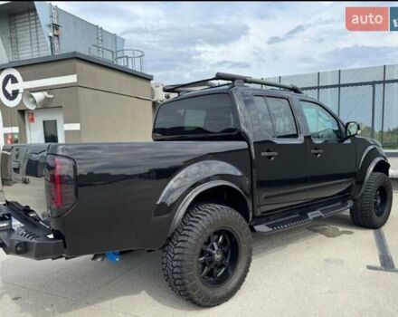 Черный Ниссан Навара, объемом двигателя 2.5 л и пробегом 230 тыс. км за 4000 $, фото 4 на Automoto.ua