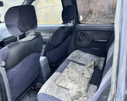 Черный Ниссан Навара, объемом двигателя 2.5 л и пробегом 165 тыс. км за 3622 $, фото 5 на Automoto.ua