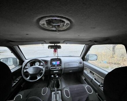 Черный Ниссан Навара, объемом двигателя 2.5 л и пробегом 165 тыс. км за 3622 $, фото 6 на Automoto.ua