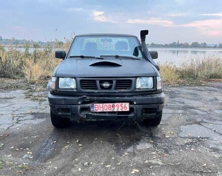Черный Ниссан Навара, объемом двигателя 2.5 л и пробегом 400 тыс. км за 3338 $, фото 4 на Automoto.ua