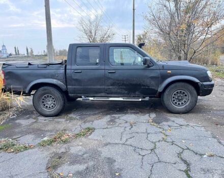 Черный Ниссан Навара, объемом двигателя 2.5 л и пробегом 400 тыс. км за 3338 $, фото 5 на Automoto.ua