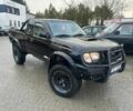 Черный Ниссан Навара, объемом двигателя 2.5 л и пробегом 293 тыс. км за 5042 $, фото 1 на Automoto.ua