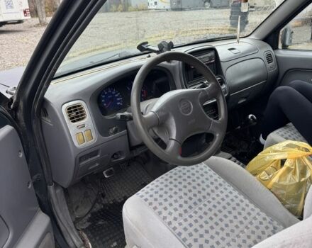 Черный Ниссан Навара, объемом двигателя 2.5 л и пробегом 1000 тыс. км за 3300 $, фото 7 на Automoto.ua