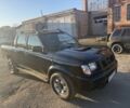 Черный Ниссан Навара, объемом двигателя 2.5 л и пробегом 286 тыс. км за 3800 $, фото 1 на Automoto.ua