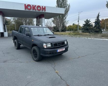 Чорний Ніссан Навара, об'ємом двигуна 2.5 л та пробігом 333 тис. км за 4200 $, фото 4 на Automoto.ua