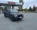 Чорний Ніссан Навара, об'ємом двигуна 2.5 л та пробігом 333 тис. км за 4200 $, фото 4 на Automoto.ua