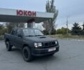 Чорний Ніссан Навара, об'ємом двигуна 2.5 л та пробігом 333 тис. км за 4200 $, фото 1 на Automoto.ua