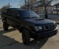 Чорний Ніссан Навара, об'ємом двигуна 2.5 л та пробігом 150 тис. км за 3500 $, фото 1 на Automoto.ua