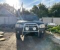 Черный Ниссан Навара, объемом двигателя 2.5 л и пробегом 300 тыс. км за 4500 $, фото 1 на Automoto.ua