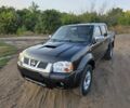 Чорний Ніссан Навара, об'ємом двигуна 2.5 л та пробігом 313 тис. км за 4515 $, фото 1 на Automoto.ua
