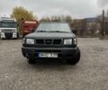 Черный Ниссан Навара, объемом двигателя 2.5 л и пробегом 1000 тыс. км за 3300 $, фото 1 на Automoto.ua