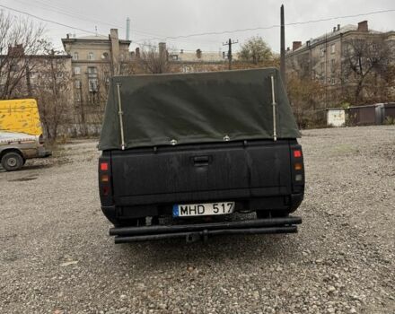 Черный Ниссан Навара, объемом двигателя 2.5 л и пробегом 1000 тыс. км за 3300 $, фото 4 на Automoto.ua