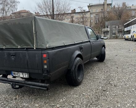 Черный Ниссан Навара, объемом двигателя 2.5 л и пробегом 1000 тыс. км за 3300 $, фото 5 на Automoto.ua