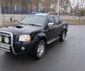 Черный Ниссан Навара, объемом двигателя 2.5 л и пробегом 377 тыс. км за 7800 $, фото 1 на Automoto.ua