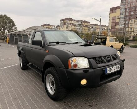 Черный Ниссан Навара, объемом двигателя 2.5 л и пробегом 200 тыс. км за 4750 $, фото 1 на Automoto.ua