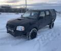 Чорний Ніссан Навара, об'ємом двигуна 2.5 л та пробігом 250 тис. км за 4800 $, фото 1 на Automoto.ua