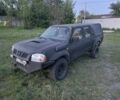 Черный Ниссан Навара, объемом двигателя 2.5 л и пробегом 250 тыс. км за 4500 $, фото 1 на Automoto.ua