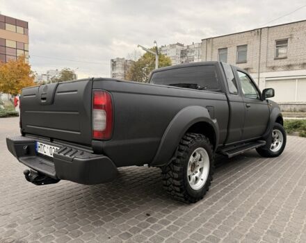 Черный Ниссан Навара, объемом двигателя 2.5 л и пробегом 200 тыс. км за 4750 $, фото 8 на Automoto.ua