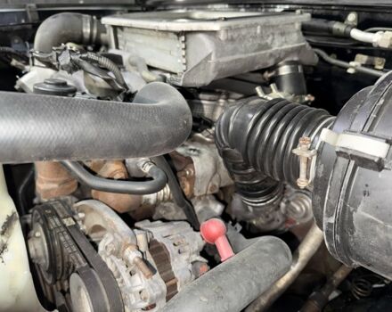 Черный Ниссан Навара, объемом двигателя 2.5 л и пробегом 200 тыс. км за 4750 $, фото 19 на Automoto.ua