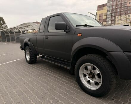 Черный Ниссан Навара, объемом двигателя 2.5 л и пробегом 200 тыс. км за 4750 $, фото 6 на Automoto.ua