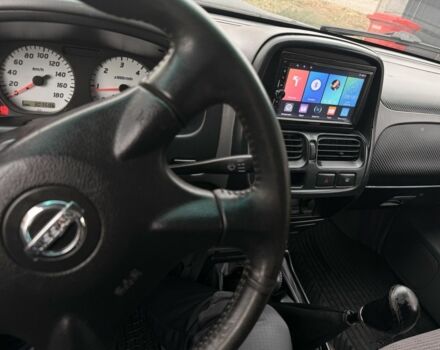 Черный Ниссан Навара, объемом двигателя 2.5 л и пробегом 200 тыс. км за 4750 $, фото 13 на Automoto.ua