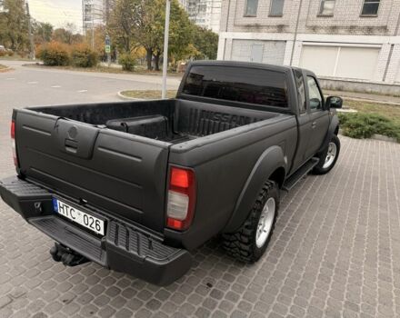 Черный Ниссан Навара, объемом двигателя 2.5 л и пробегом 200 тыс. км за 4750 $, фото 7 на Automoto.ua
