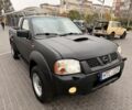 Черный Ниссан Навара, объемом двигателя 2.5 л и пробегом 200 тыс. км за 4750 $, фото 1 на Automoto.ua