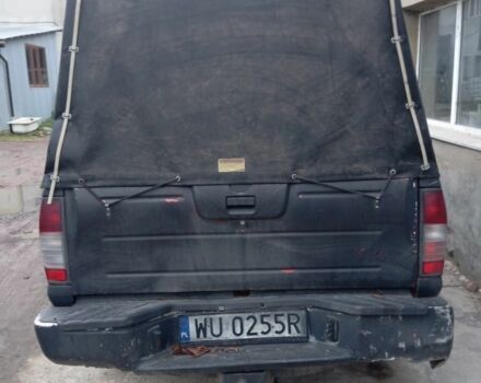 Черный Ниссан Навара, объемом двигателя 0 л и пробегом 280 тыс. км за 2697 $, фото 4 на Automoto.ua