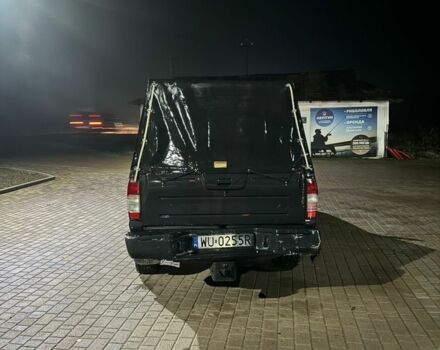 Чорний Ніссан Навара, об'ємом двигуна 3 л та пробігом 300 тис. км за 3200 $, фото 2 на Automoto.ua