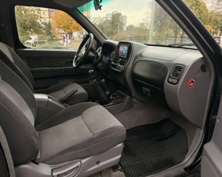 Черный Ниссан Навара, объемом двигателя 2.5 л и пробегом 200 тыс. км за 4750 $, фото 11 на Automoto.ua