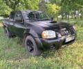 Чорний Ніссан Навара, об'ємом двигуна 2.5 л та пробігом 240 тис. км за 3850 $, фото 1 на Automoto.ua