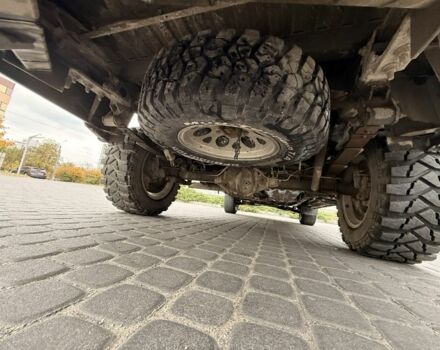 Черный Ниссан Навара, объемом двигателя 2.5 л и пробегом 200 тыс. км за 4750 $, фото 15 на Automoto.ua