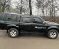 Черный Ниссан Навара, объемом двигателя 2.5 л и пробегом 213 тыс. км за 6000 $, фото 5 на Automoto.ua