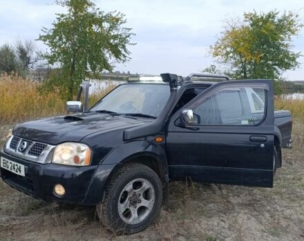 Черный Ниссан Навара, объемом двигателя 2.5 л и пробегом 100 тыс. км за 5300 $, фото 2 на Automoto.ua