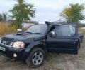 Черный Ниссан Навара, объемом двигателя 2.5 л и пробегом 100 тыс. км за 5300 $, фото 2 на Automoto.ua